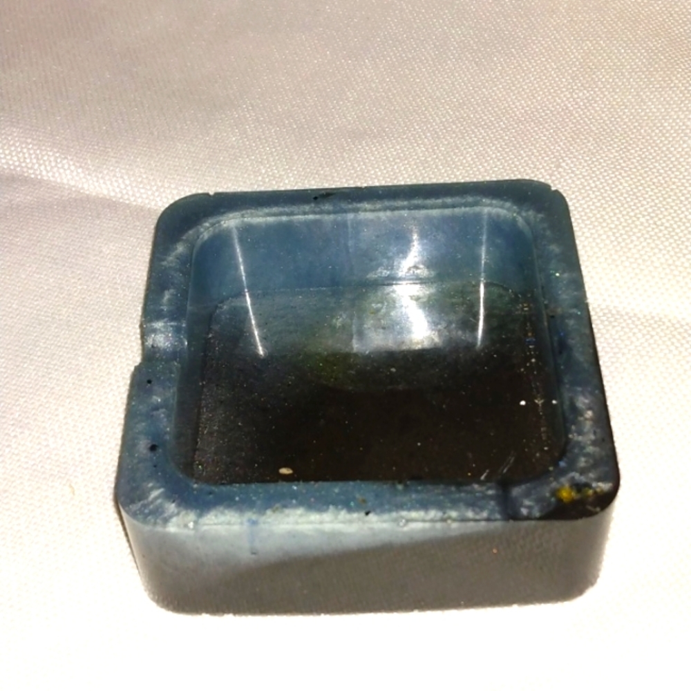 Blue and black ashtray